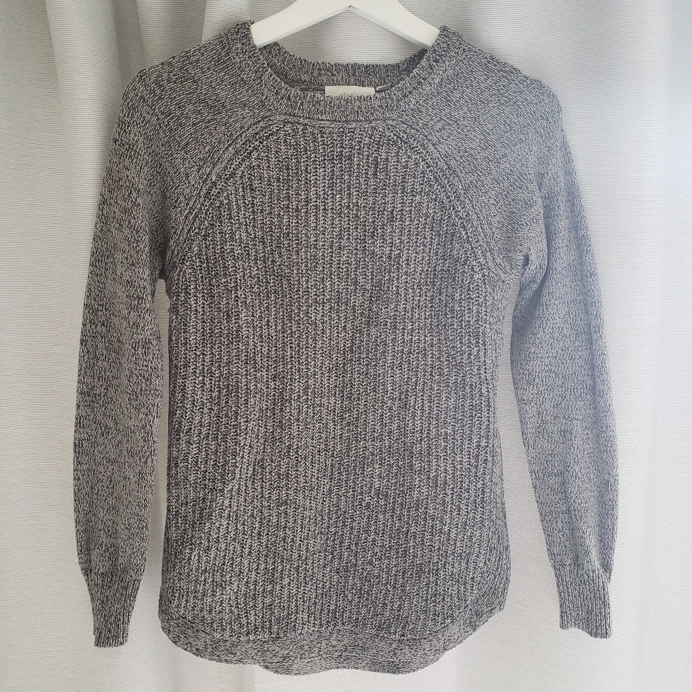 Knit sweater.